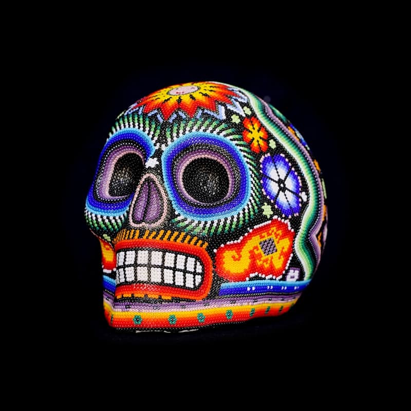 Colorful Day of the Dead altar with marigolds and sugar skulls